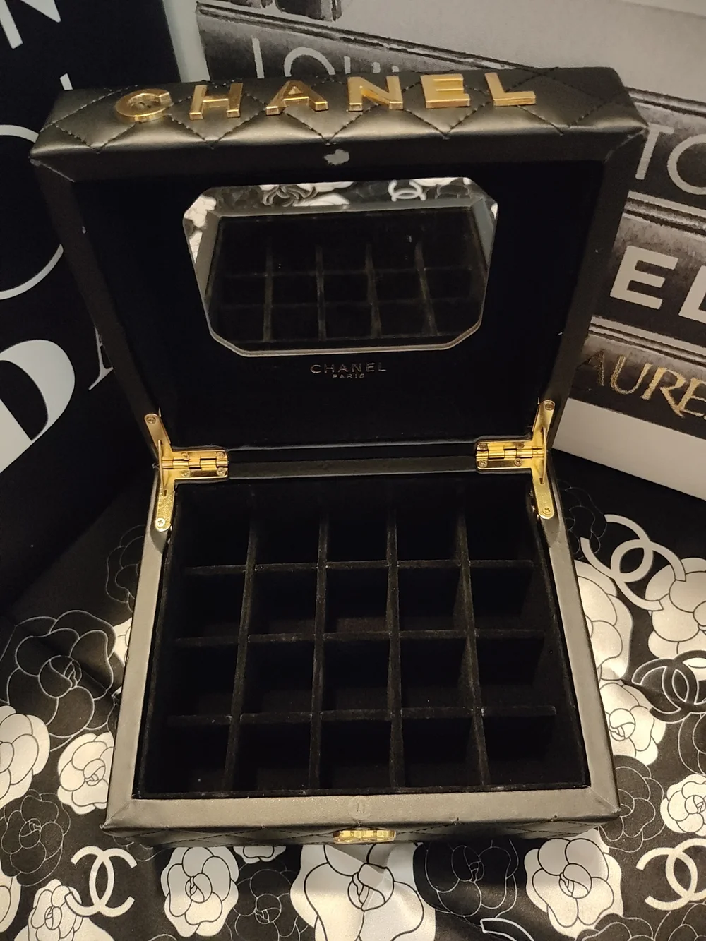 Black Quilted Jewelry Case with Gold Logo Accents And Mirror